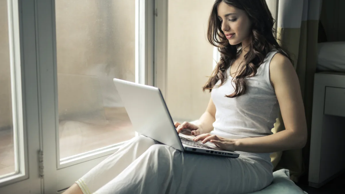 A non-technical professional studying at a desk