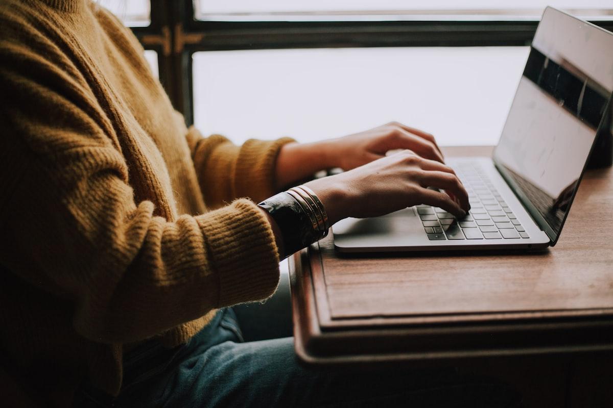 A student working independently on a laptop — the kind of routine academic activity our AI uses to spot early signs of difficulty