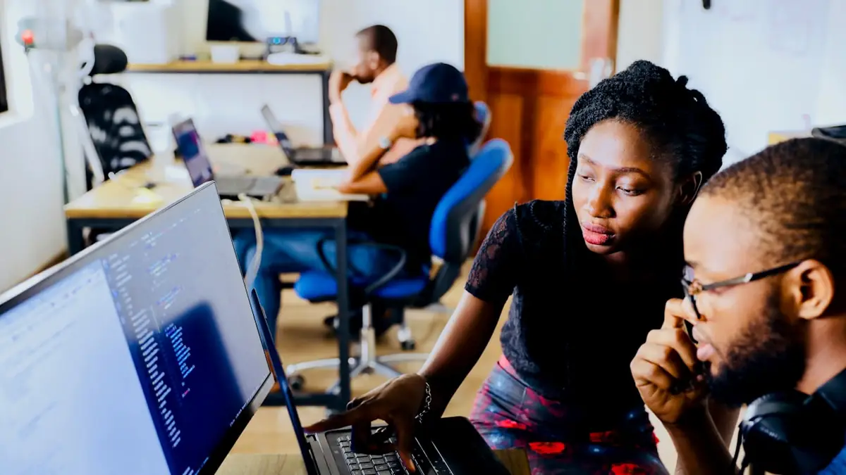 A learner studying on a laptop at home