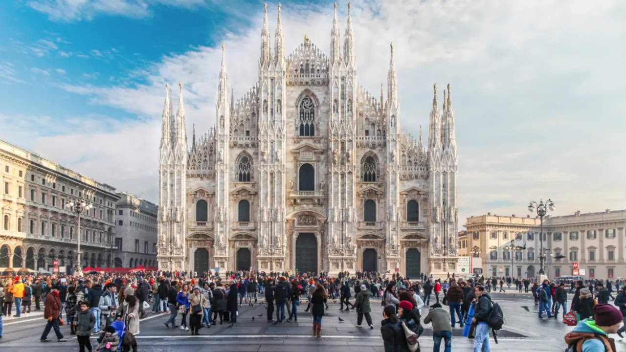 Crowds in front of Milan Cathedral on a sunny day