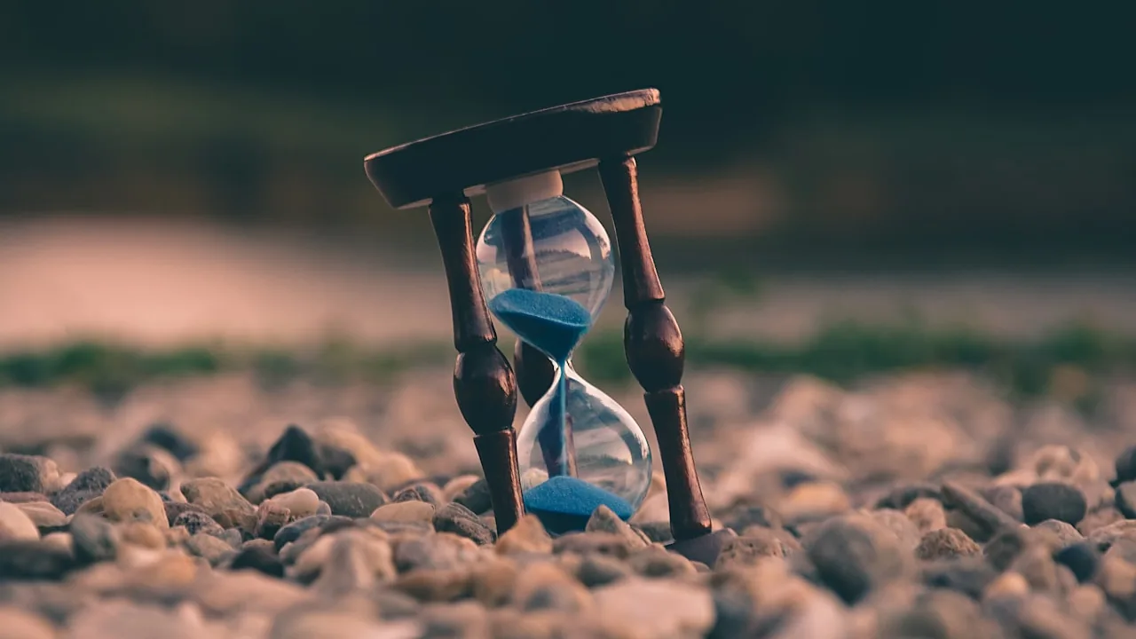 A clock and workspace representing time planning