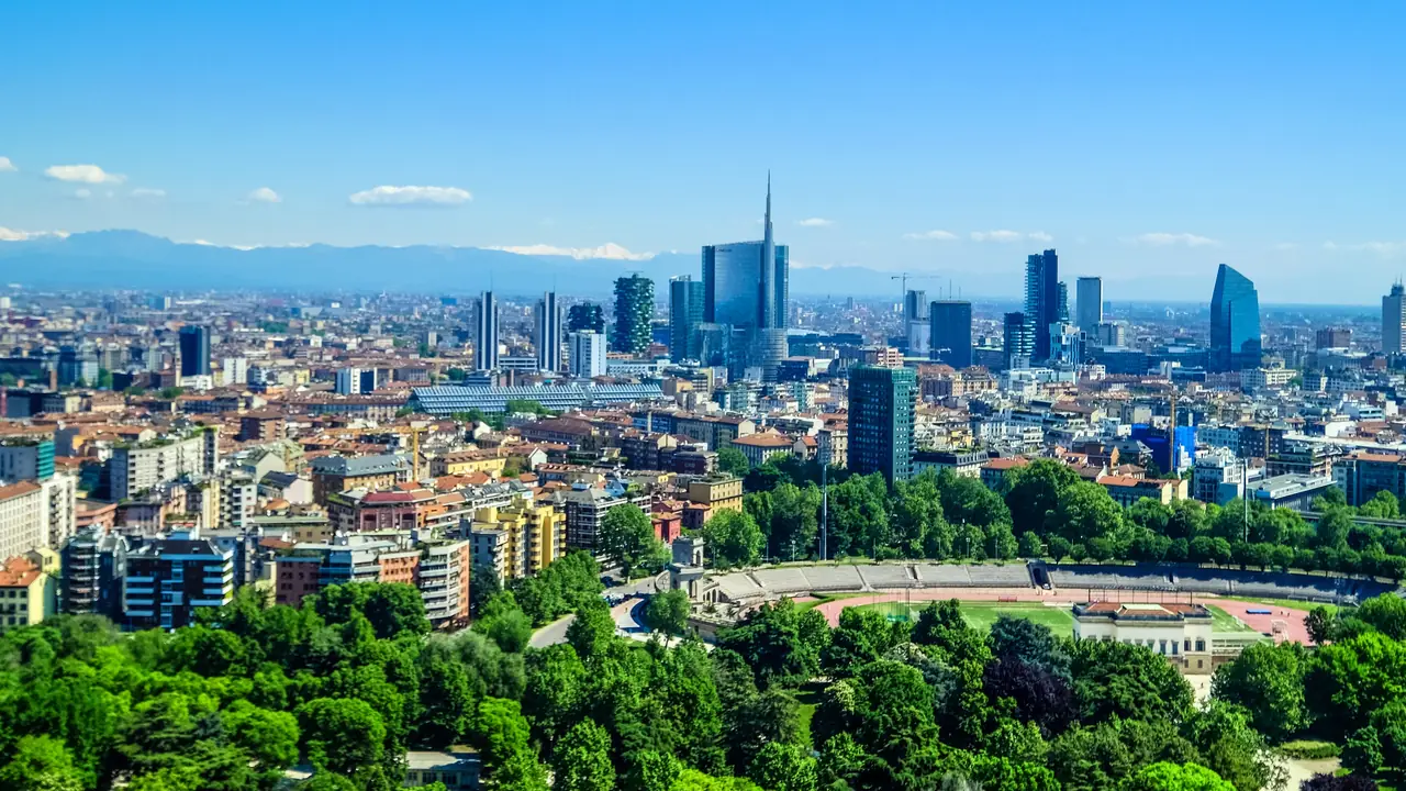 Milan business district skyline with modern skyscrapers, representing Italian students pursuing a UK business qualification