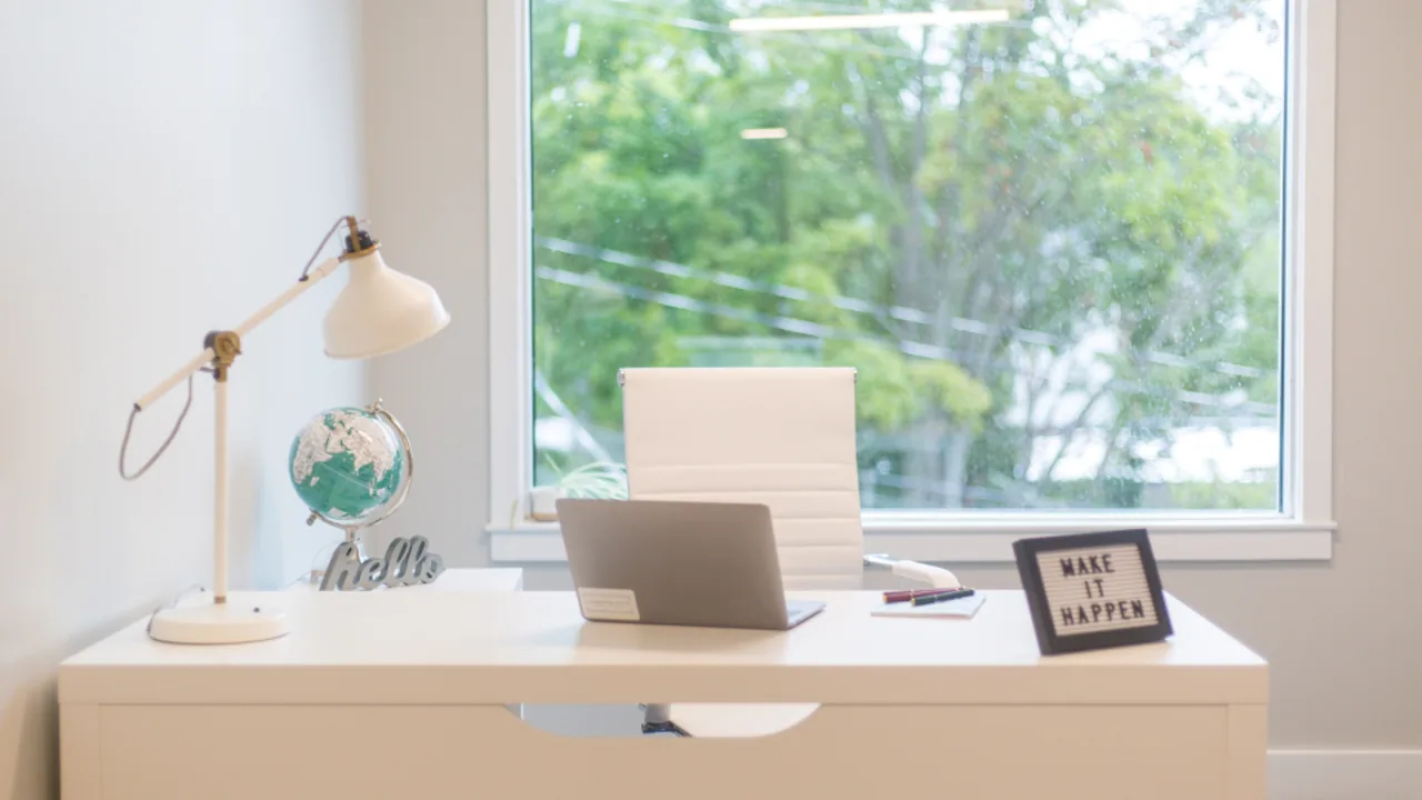 Remote worker on a video call from a home office