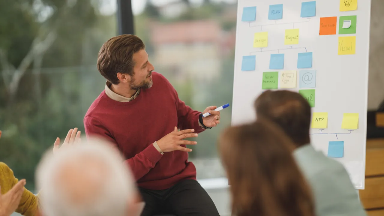 A business presentation being delivered to an audience