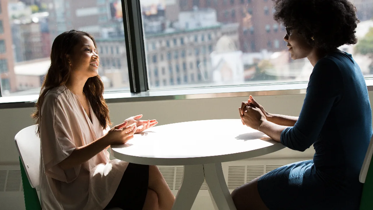 A manager presenting business charts in a meeting