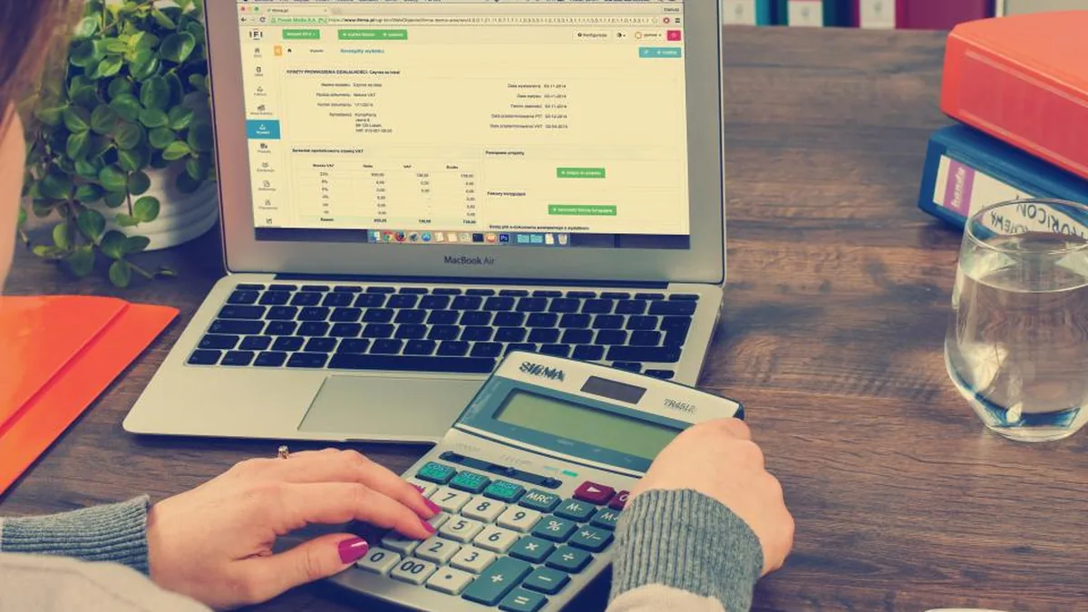Someone calculating return on an investment