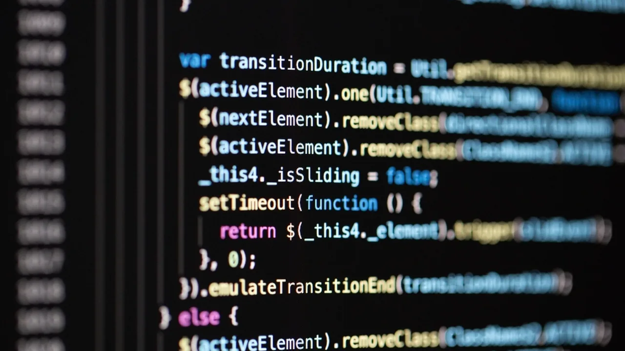 A developer working with code and data on screen