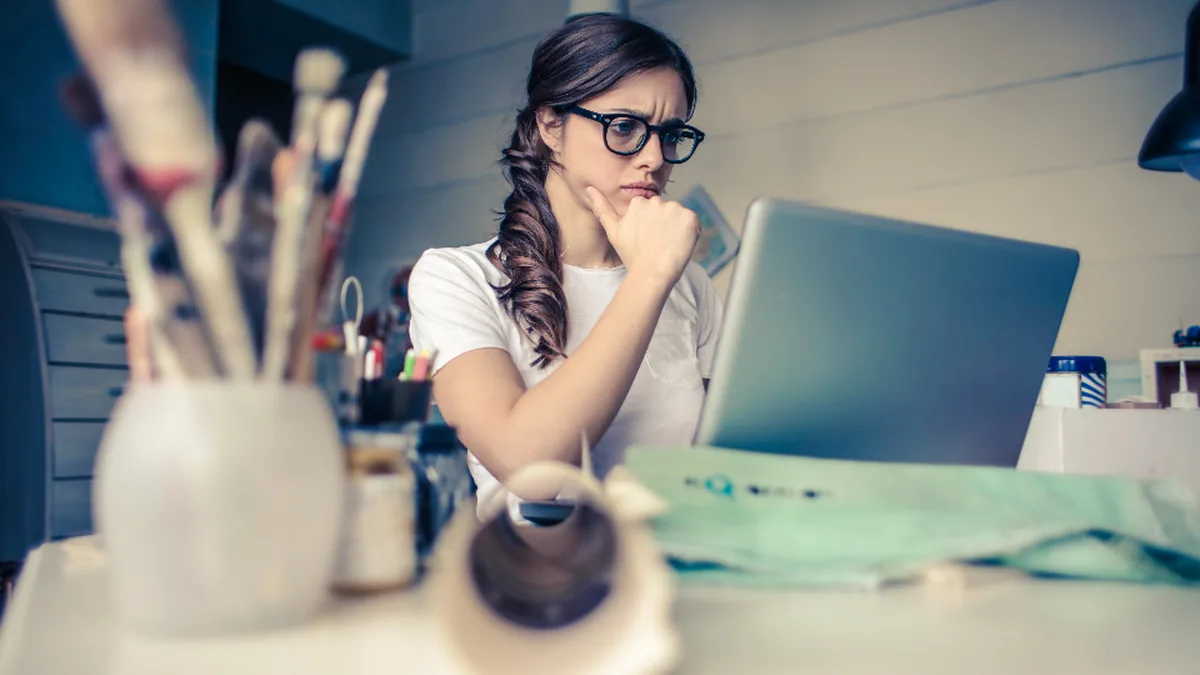 A learner working through a difficult concept