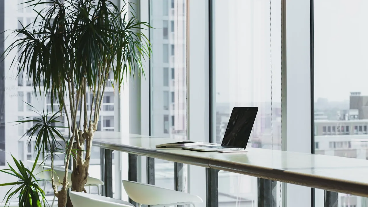 A modern open-plan office with people at work