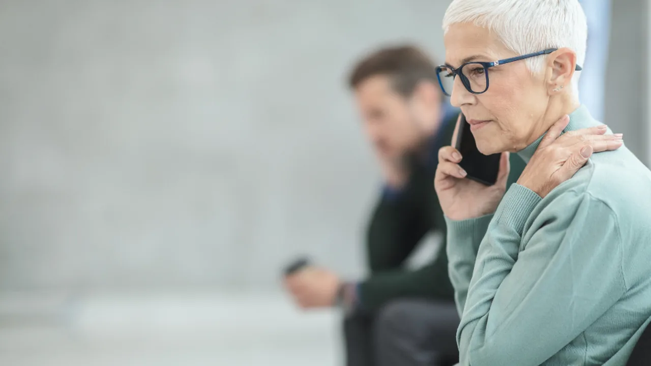 Taking an interview call in an office